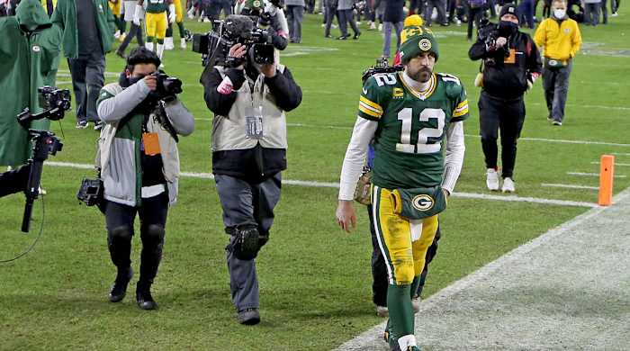 Aaron Rodgers leaves the walks off the field after the 2020 NFC Championship game.